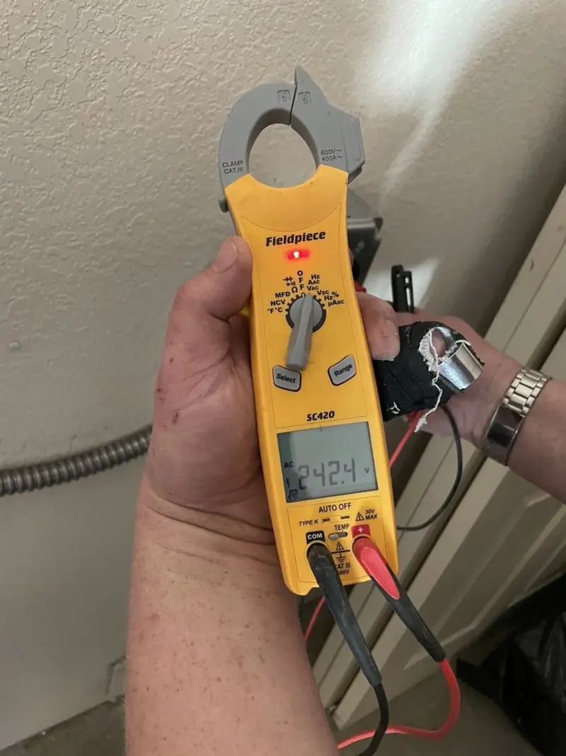 Voltage testing with clamp meter during Hot Tub / Pool Electrical Wiring in Hoover
